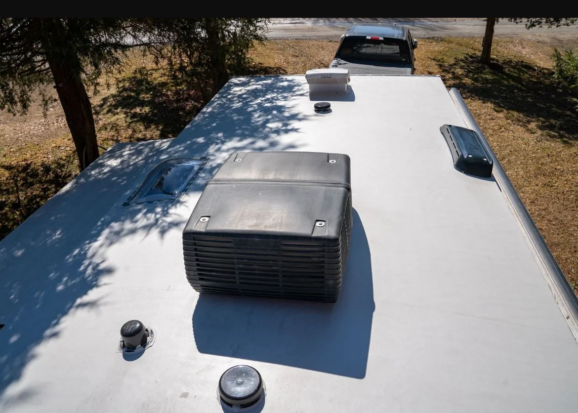 AC capacitor and fan motor replacement on a rooftop unit